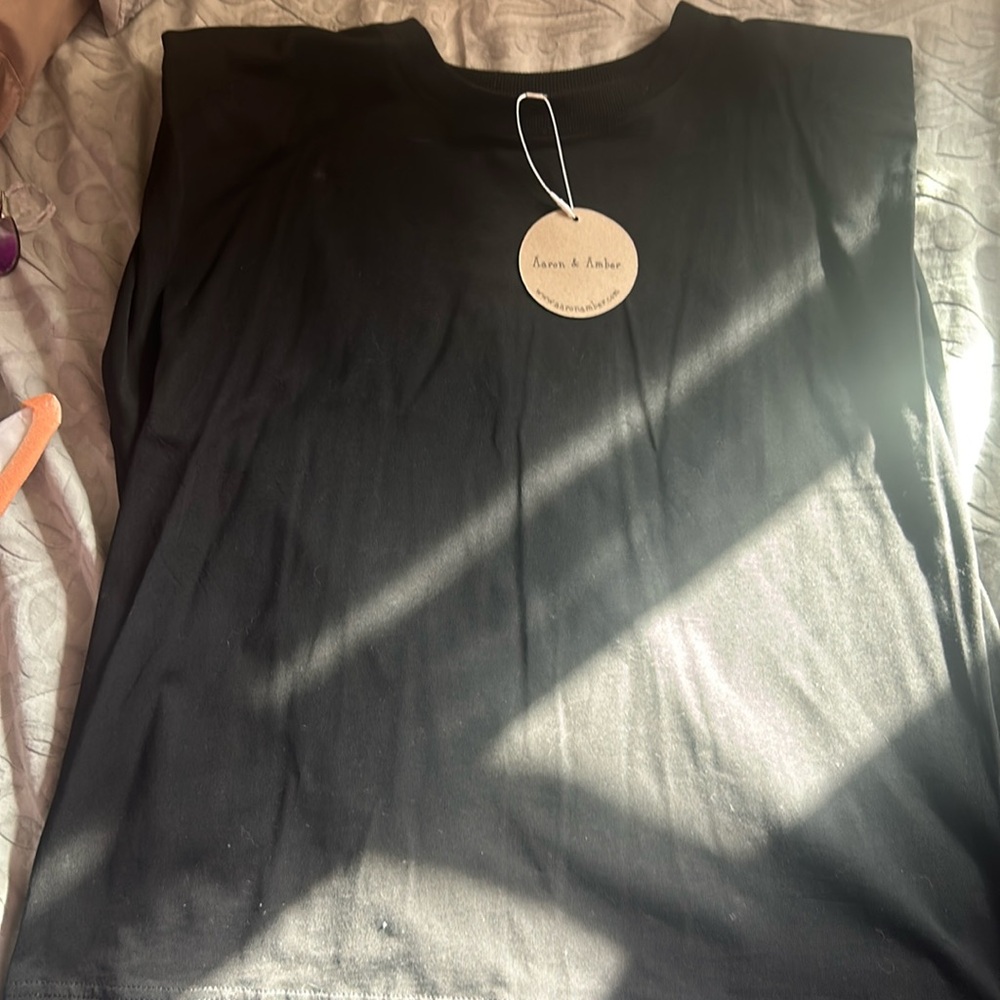 Large cut off sleeve new with tag
